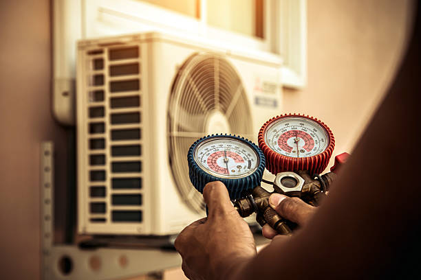 Professional Air Conditioning Service technician working in Germantown, TN